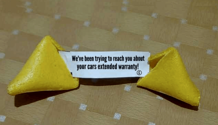 Example of a fraudulent text message claiming vehicle warranty issues requiring immediate action